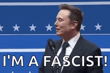elon musk is giving a speech and says i 'm a fascist