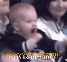 a baby is screaming in a crowd and the words nba excitement are visible