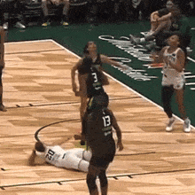 a basketball player with the number 13 on his jersey