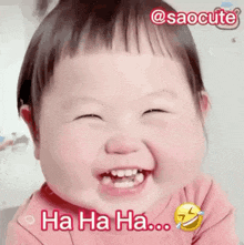a baby is laughing and making a funny face with the words `` ha ha ha '' .