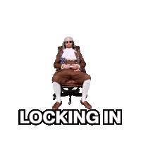 a man in a suit is sitting in a chair with a red arrow pointing down and the words locking in below him