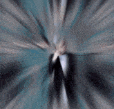 a blurred image of a man in a suit and tie
