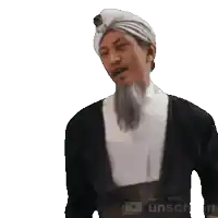 a man wearing a turban and a white shirt is made with unscreen