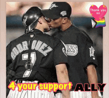 a baseball player with the name rodriguez on his back kisses another player
