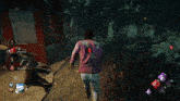 a man in a pink jacket is walking in a video game with the name katie on the screen