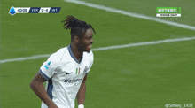 a soccer player with the number 3 on his jersey is celebrating