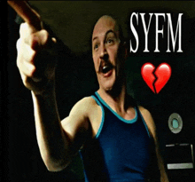a man in a blue tank top is pointing with syfm written on the bottom