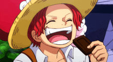a cartoon character with red hair and a straw hat is smiling and holding a chocolate bar
