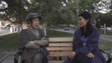 two women sitting on a bench talking to each other with the words what do you mean it 's gone