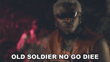 a man wearing sunglasses and a brown vest says old soldier no go diee