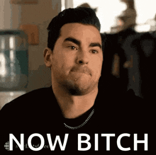 a man is making a funny face with the words now bitch above him