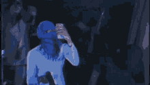 a blurry picture of a man wearing a mask
