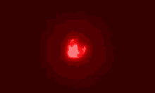 a red heart with a shadow of a man and woman in it