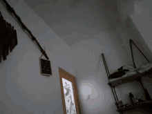 a chalkboard hanging on a wall that says " welcome "