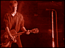 Bryan Adams Guitarist GIF - Bryan Adams Guitarist Rock And Roll GIFs
