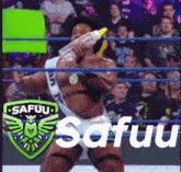 a man is in a wrestling ring holding a bottle and the word safuu is on the bottom