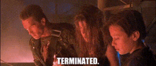 a group of people standing next to each other with the word terminated on the bottom