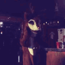 dancing in costume red nosed reindeer mascot rudolph