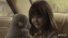 Playing With Stuffed Toy Guillermina Sorribes Liotta GIF