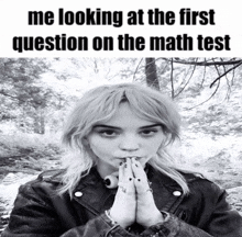 a black and white photo of a girl with the words me looking at the first question on the math test