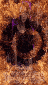 a woman in a black top is surrounded by flames and the word chaos is visible