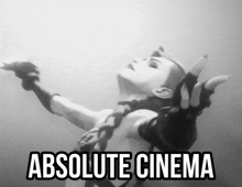 a black and white photo of a woman with the words absolute cinema below it