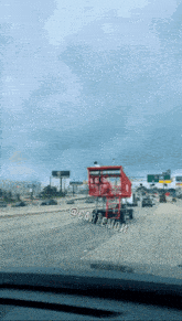 a view of a highway from a car with the words @cartemon on the bottom right