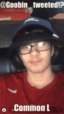a man wearing glasses and a hat with the words " goobi tweeted " above him