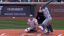a baseball player with the number 22 on his jersey swings at a ball