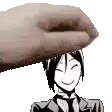a hand is putting a cartoon character 's head on top of another cartoon character 's head .