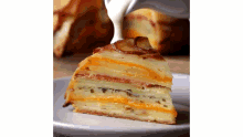 a white plate topped with a slice of potato pie