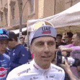 a man wearing a hat that says uae