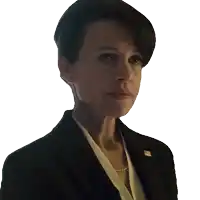a woman in a suit has a pin on her jacket that says ' president '