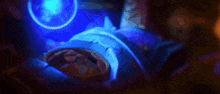 a close up of a person 's arm with a blue light shining on it .
