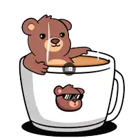 a brown teddy bear is sitting in a cup of coffee