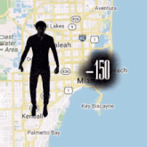a silhouette of a man is flying over a map of miami with key biscayne in the background