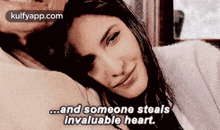 a woman is laying on a man 's shoulder and someone steals invaluable heart .
