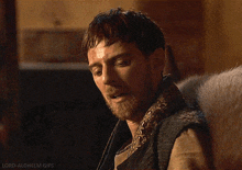 a close up of a man 's face with the words lord-aldhelm gifs visible