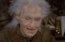 an old man with gray hair and a fake nose