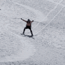 a man without a shirt is skiing down a snowy mountain