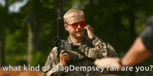 a man in a military uniform is holding a gun and wearing red sunglasses while talking on a cell phone