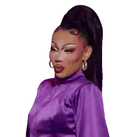 a drag queen wearing a purple jacket and hoop earrings looks at the camera
