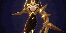 a person is holding a sword in their hand in a video game .