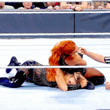 Becky Lynch Natalya GIF - Becky Lynch Natalya Disarm Her GIFs