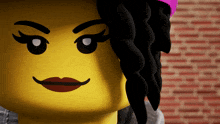 a close up of a lego face with black hair