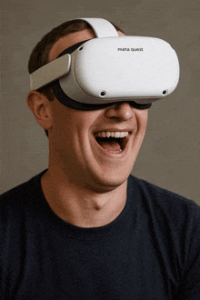 a man wears a meta quest virtual reality headset