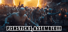 a group of people standing in front of a fire and the words fishsticks assemble