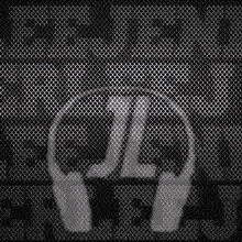 a black and white photo of a pair of headphones with the letter l on them