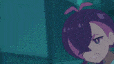 a person is holding a purple object with a purple light coming from it