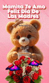 a teddy bear is holding a cup of coffee next to a bouquet of roses